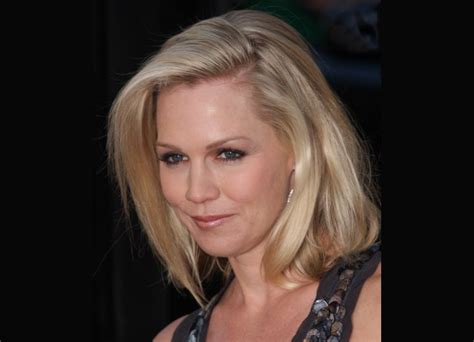 Jennie Garth Wearing Her Hair With The Top Styled Over To One Side