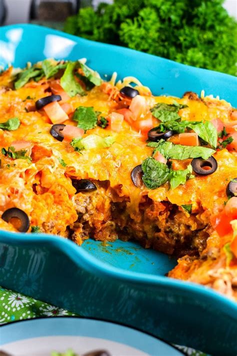 Spread 1/2 of the chicken mixture over the dorito chips. Ground Beef Doritos Casserole | Soulfully Made