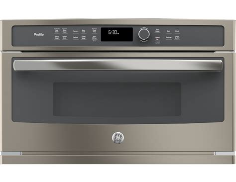 A microwave oven, or microwave, is a kitchen appliance employing microwave radiation primarily to cook or heat food. GE Profile Slate Microwave Convection Oven - PWB7030ELES