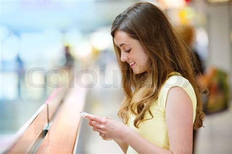 Shopping Girl With Smartphone Stock Image Colourbox