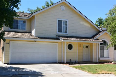 Home has a open family room and a large kitchen with lots of cabinet space. 3 bedroom 2.5 bath house for sale Fresno CA, 93720