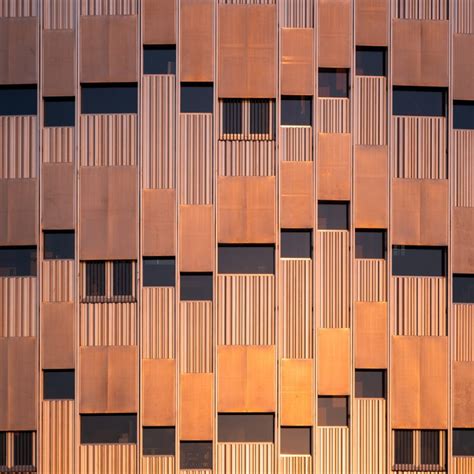 A Facade Of Perforated Metal Screens The Cylindrical Kalvebod Fælled