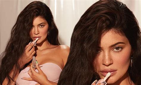 Kylie Jenner Bares Toned Abs In A Pink Strapless Bra While Touting