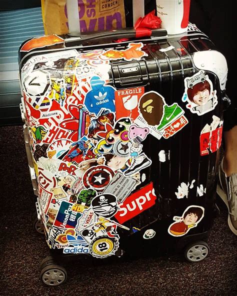 I Can Only Assume That The Stickers Are Actually Holding The Suitcase