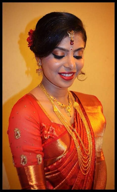 Hairstyles for an indian wedding. Indian bride's reception hairstyle by Swank Studio | South ...