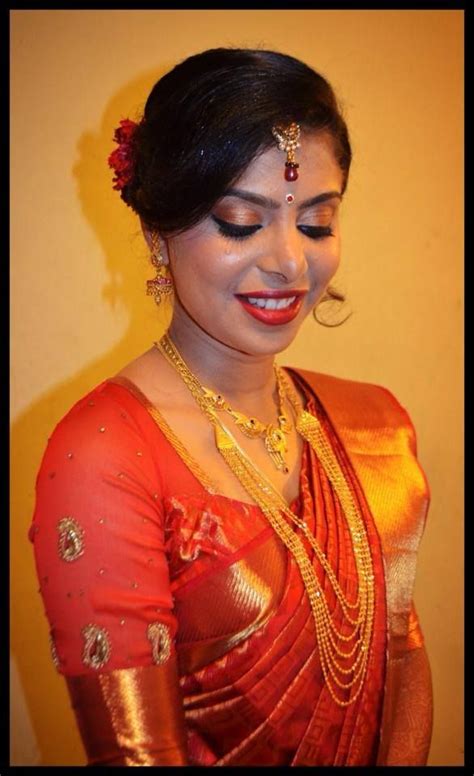 Indian weddings are crazy, there are so many functions and ceremonies. Indian bride's reception hairstyle by Swank Studio | South ...