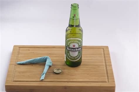 You can open a beer bottle by using a countertop or table. How to Open a Beer With a Napkin: 9 Steps (with Pictures)