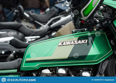 Kawasaki Logo On Green Vintage Motorbike Parked In The Street Editorial