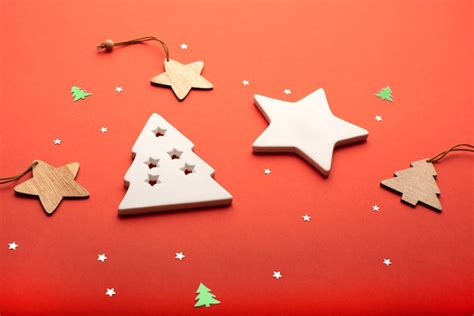Premium Photo Star And Christmas Trees On A Bright Red Background