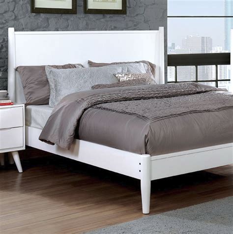 Bed base crafted of processed wood in white finish complements the tufted headboard. Skylar Panel Platform Bed (White, Black, Gray & Oak ...
