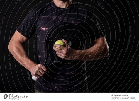 Man Ready For Paddle Tennis Serve In Studio Shot Anonymous Pose A