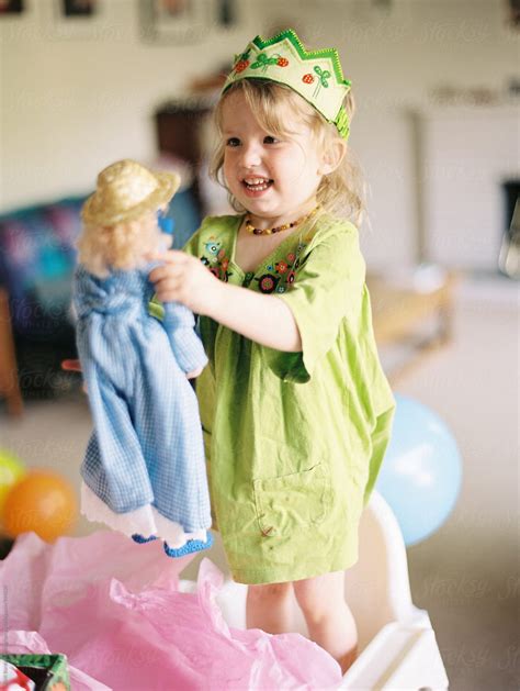 Girl Opens Birthday Presents By Stocksy Contributor Kirill Bordon Photography Stocksy