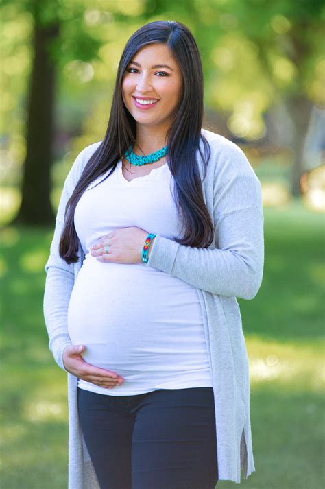 Pregnant Native American Woman Holding Belly