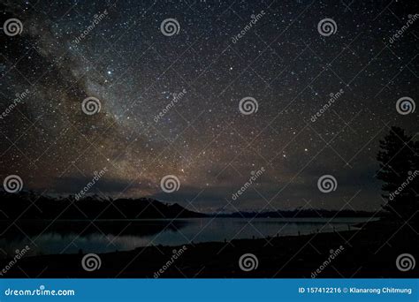 Beautiful Milky Way Starry Night Over The Snow Mountain At Lake Pukaki