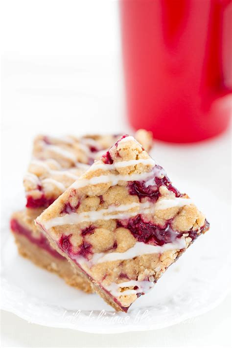 Line the bottom and sides of a 9 x 13 inch baking pan with parchment paper, leaving some overhang on the sides for easy removal. dailydelicious: Vegan Raspberry Bars