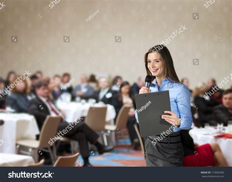 Beautiful Business Woman Is Speaking On Conference Stock Photo