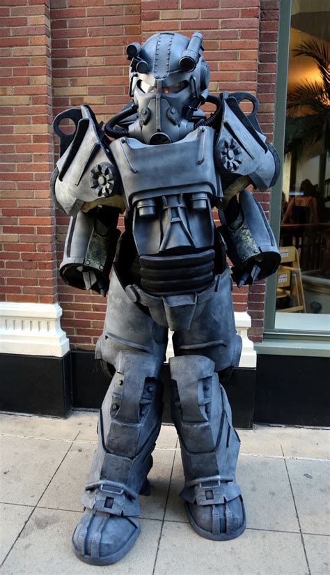 one of the brotherhood of steel wearing t 60 power armor from the video game fallout 4 t 60