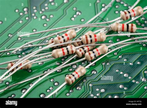 Closeup Heap Of 1k Or 1000 Ohms Resistors On Circuit Board Stock Photo