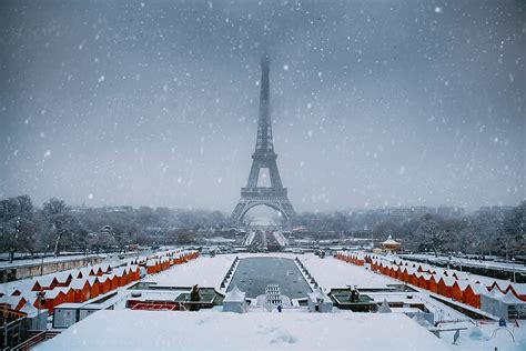 Eiffel Tower In Paris France During A Snow Blizzard By
