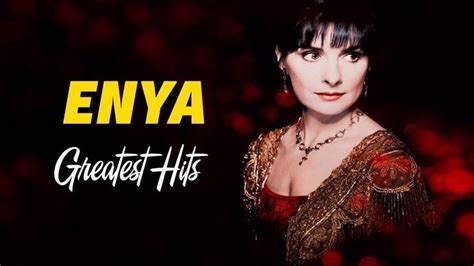 A Woman In A Red Dress With The Words Enya Greatest Hits On Her Face
