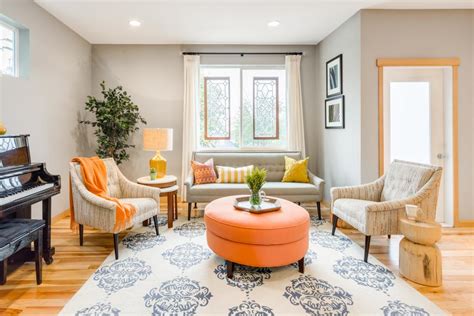 Gray Transitional Living Room With Orange Ottoman Harmony Weihs Hgtv