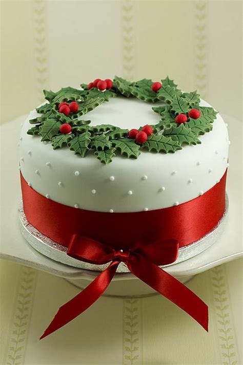 This beautiful cake features cute christmas trees that are actually ice cream cones covered with green buttercream frosting and decorated with colorful holiday. Awesome Christmas Cake Decorating Ideas - family holiday.net/guide to family holidays on the ...