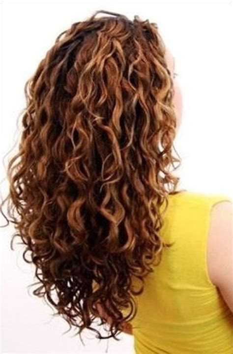 Clip the rest of your hair up so only the bottom layer is present. Beautiful curly layered haircut style ideas 7 - Fashion Best