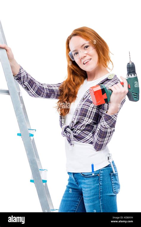 Girl With A Drill And Stepladder On A White Background Stock Photo Alamy