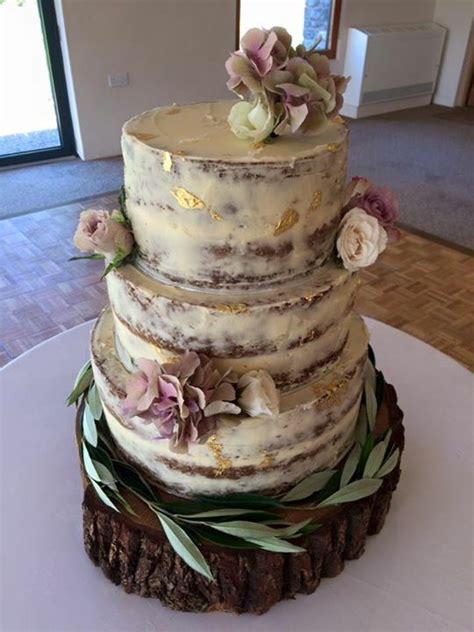 My Own Tier Naked Carrot Wedding Cake With Vanilla Buttercream Gold Leaf And Fresh Flowers