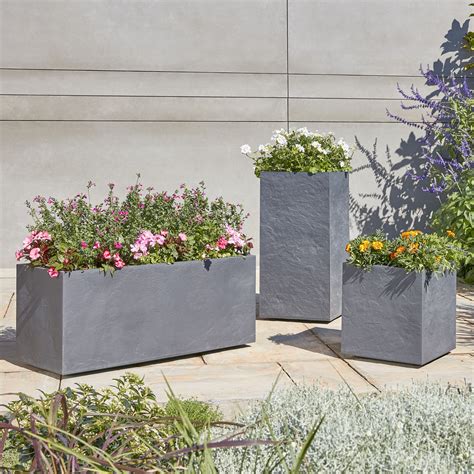 Bandqs Durdica Rectangular Troughs Filled With Bright Flowers Are A