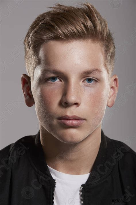 White Teenage Boy Looking To Camera Portrait Vertical Stock Photo