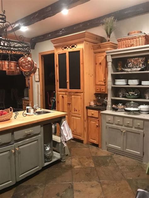 This kitchen had a lot of knotty pine wood. Any ideas on how to update my knotty pine cabinets or pot ...