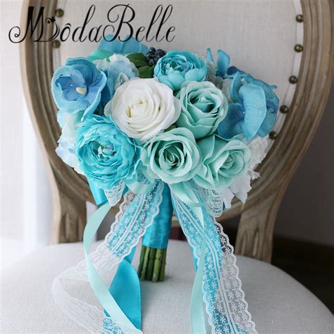 This color reminds people of the clean water in tropical oceans and of course the jewelery tiffany & company for which tiffany blue is a trademarked color. modabelle Vintage Orchid Rose Peony Flowers Tiffany Blue ...