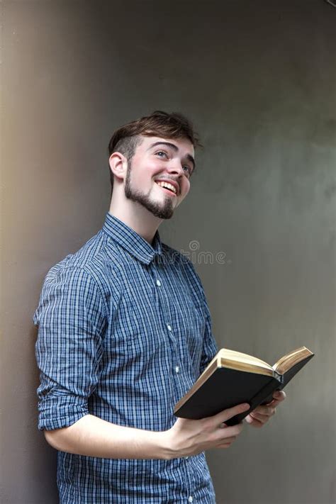 Young Man Smile And Reading The Bible Book Stock Photo Image Of Face