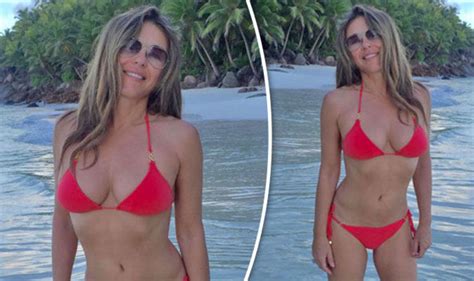 Elizabeth Hurley Looks Red Hot As She Flashes Cleavage In Tiny Bikini