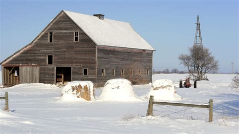 Wooden Barn And Old Tractor On Snow Covered Farm Lifestyle