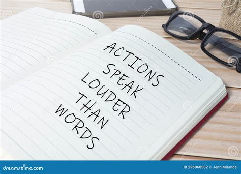 Actions Speak Louder Than Words Text on Notepad. Business Concept