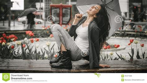 Happy Smiling Woman Under Umbrella In Rain Stock Image