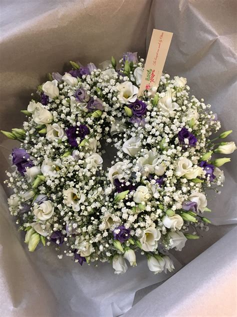 On our website everyone can order. This arrangement contains white and purple lisianthus ...
