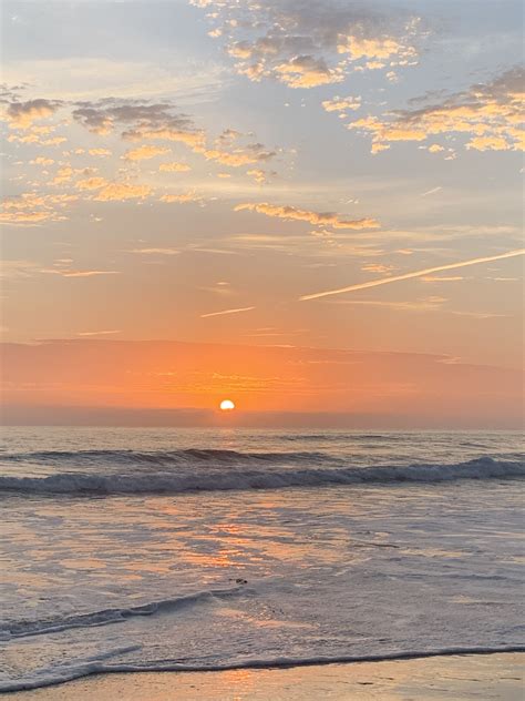 Beach Aesthetic Sunset Orange Tones Blue Waves And Fluffy White Clouds Ocean Sunset Photography