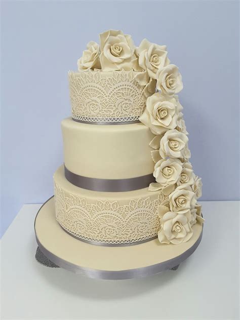 Lace And Cascading Rose Wedding Cake Wedding Cake Roses Cake