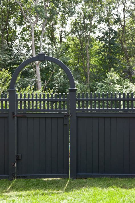 The gate breaks up that already fabulous hedge. Fancy Your Home's Exterior & Landscape with These Inspiring Home Fencing Ideas | HomesFeed