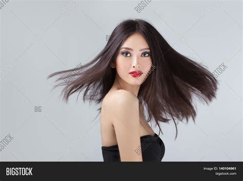 Download all photos and use them even for commercial projects. Beautiful Asian Coasian Woman Long Image & Photo | Bigstock