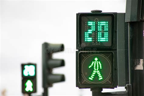 Green Traffic Light For Pedestrians Counting Down In 20 Seconds In