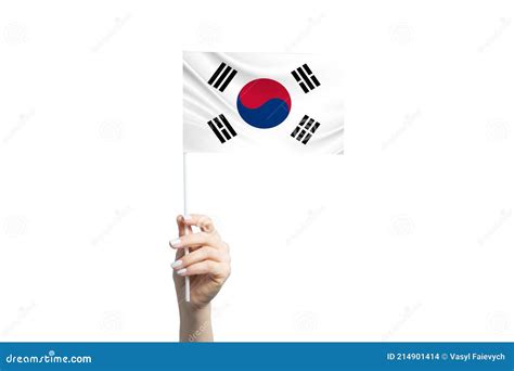 Hermosa Mano Femenina Sosteniendo La Bandera De Corea Del Sur Aislada