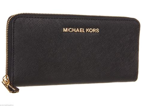 Large logo and leather wristlet. How to Choose a Michael Kors Wallet | eBay