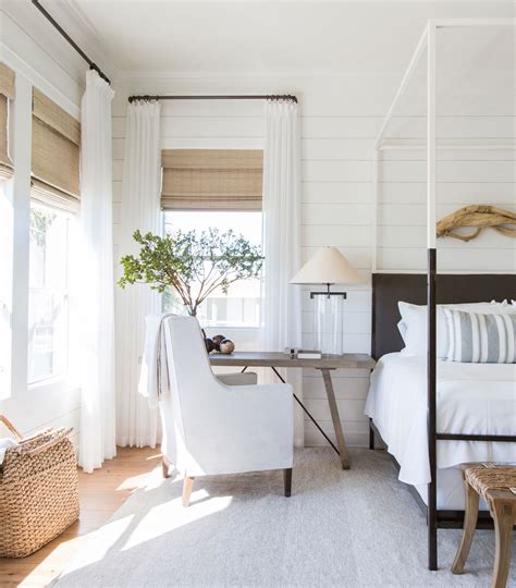 Gorgeous country bedroom with white and neutral bedding, shiplap. 15 Primary Bedroom Decorating Ideas and Design Inspiration ...