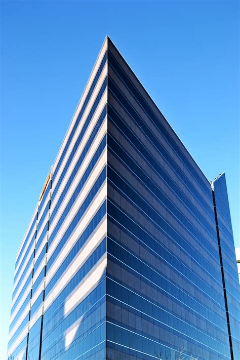 Free Photo Modern Skyscraper On A Background Of Blue Sky