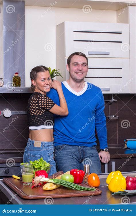 Young Happy Couple In The Kitchen Making Organic Salad Stock Image Image Of Happy Lifestyle