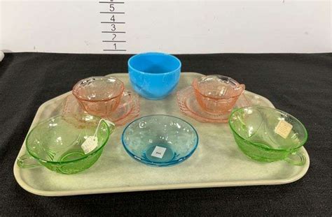 Glassware Includes Green And Pink Depression Glass Cup And Saucers And